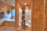 Loft Master Bathroom with a Shower Stall and a Jetted Garden Tub 